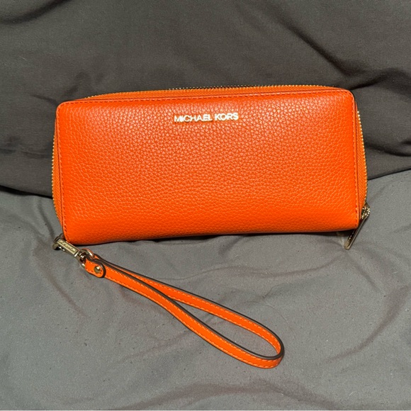 MICHAEL KORS JST 
Leather Continental Wristlet Phone Case Wallet 
Poppy 
NWT - Picture 1 of 2